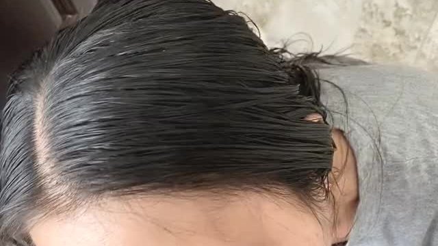 Doing what an Asian woman does best...