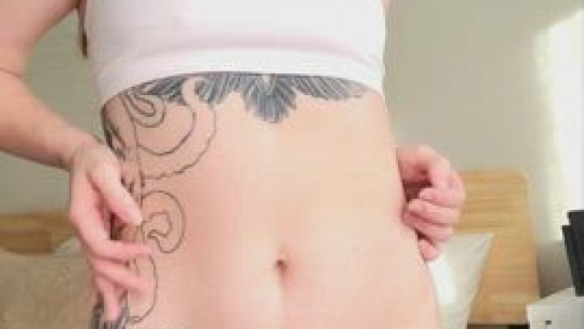 Redhead shows off her tiny ass