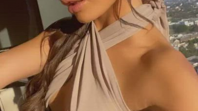 Lifting up her skirt