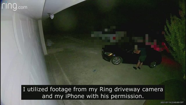 Hubby watches as I let a cub have his way in our driveway ;)