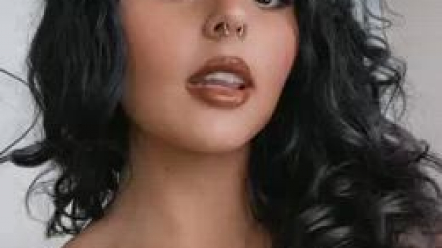 mixed 19 year old showing off her natural DDs