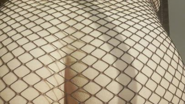 Spreading my cheeks in my fishnet dress