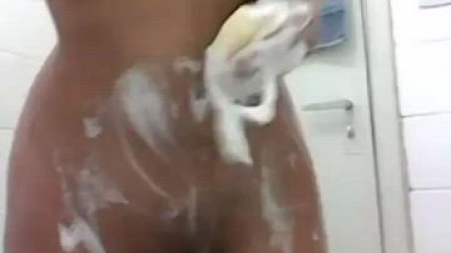 Latina with hot body in the shower