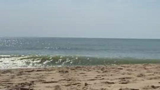 Husband filming me on the beach..........