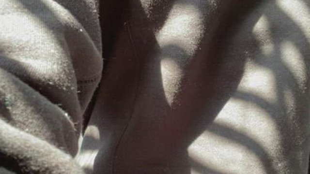 A petite teen hiding under a big sweater