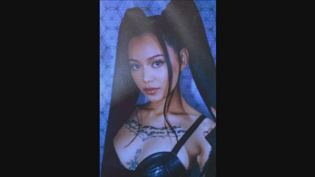 Bella Poarch is sexy in leather and tats