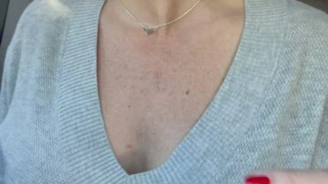 40 yo mother lady, in line at the bank drive through