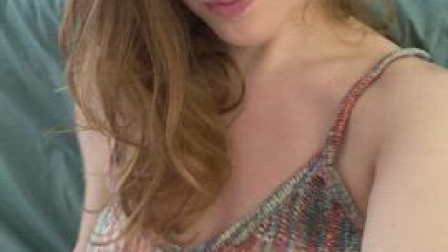 Your casual redhead next door - except very busty!