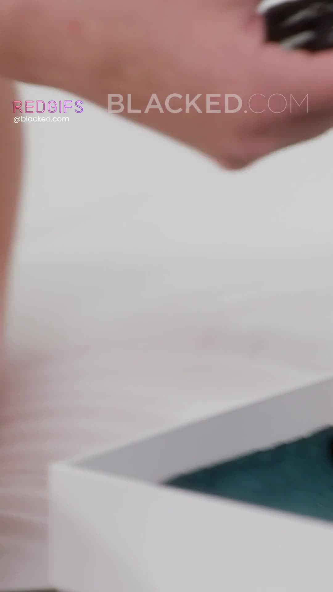 Redhead, black lingerie.